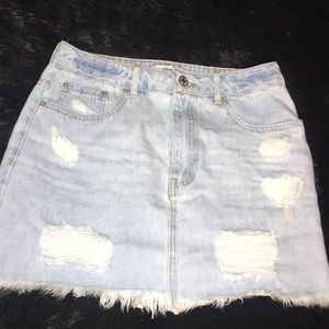 Distressed denim skirt